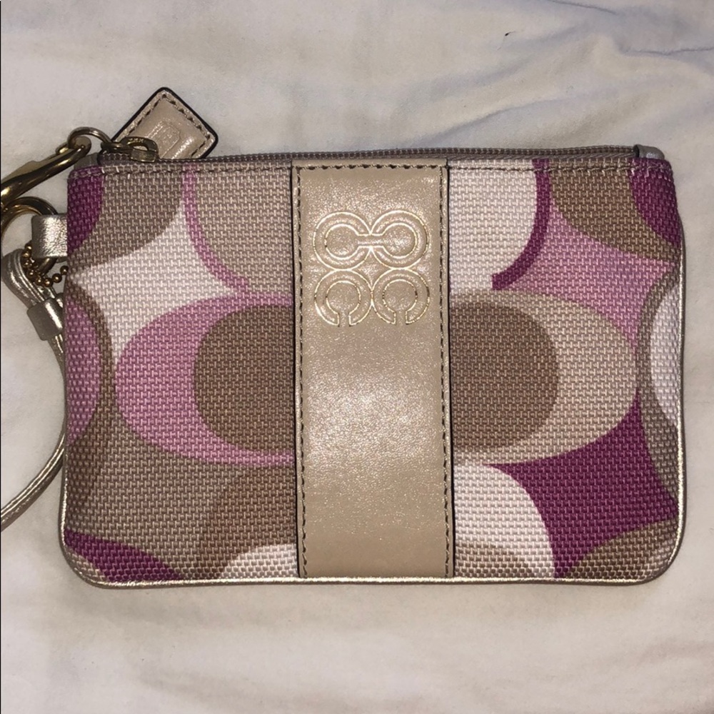 COACH wristlet with pink and cream detailing!
